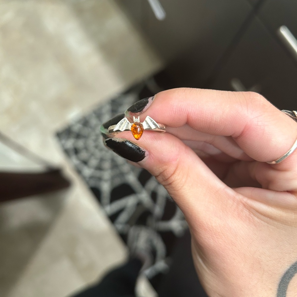 Bat ring with amber